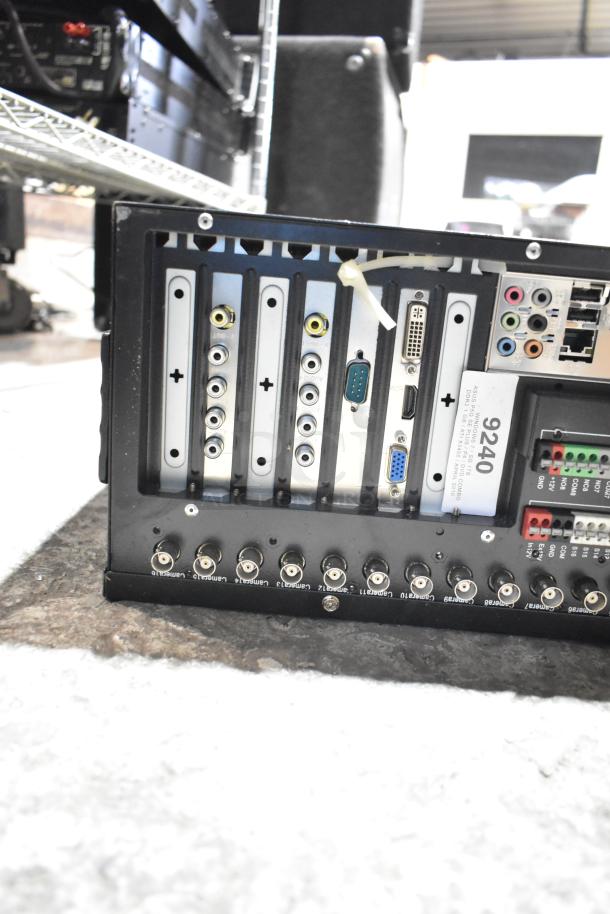 Rack unit with multiple input/output ports and connectors, visible label with number 9240, part of 2-item auction set including DVD unit.