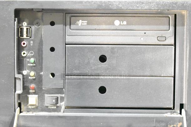 LG rack unit with integrated DVD playing unit. Features USB, audio ports, power and reset buttons. Functional and in good condition.