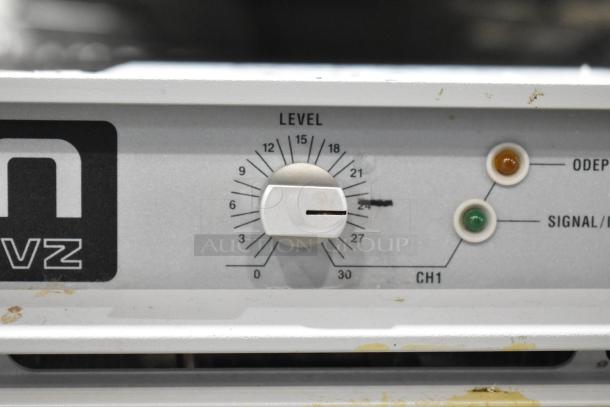 Crown Macro Tech 3600VZ power amplifier, showing level dial and indicators, fair condition with visible wear.