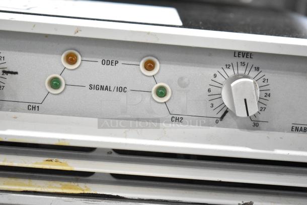 Crown Macro Tech amplifier front panel with "ODEP" and "Signal/IOC" indicators visible.