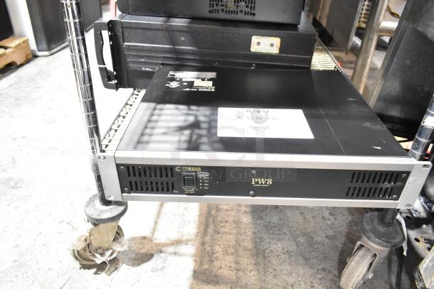 Crown Macro Tech 3600VZ and 2400 Amplifiers, Yamaha PW8 Power Supply, used condition, visible markings on units.