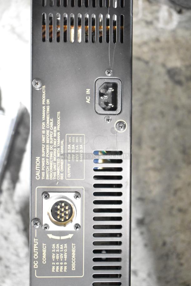 Crown Macro Tech 3600VZ power amplifier rear panel with AC input and labeled DC output ports.

