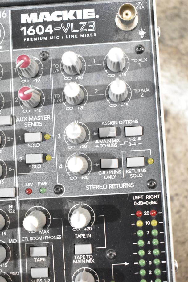 Mackie 1604-VLZ3 mixer, featuring multiple knobs and switches, labeled sections, in good condition.