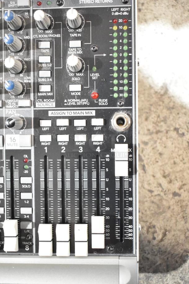 Mackie 1604-VLZ3 Mixer with faders, knobs, and input jacks shown. Features mic/line mixing capabilities. Good condition.