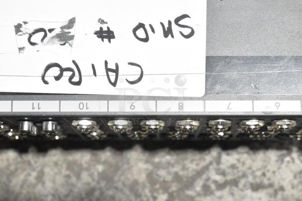 Mackie 1604-VLZ3 Premium Mic/Line Mixer, showing numbered input ports, condition good, visible handwritten label.