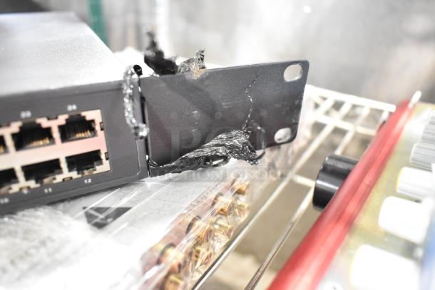 Dell PowerConnect 2024 Switch with Ethernet ports, visible alongside a Rane CP 64S Processor and Alto Link Mixer.