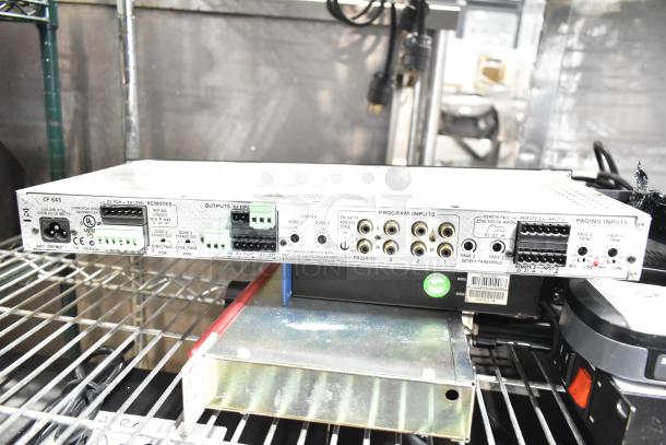 Dell PowerConnect 2024 Switch and Rane CP 64S Processor, Alto Link Splitter Mixer, Furman PLP Power Conditioner, on metal shelf.