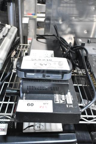 Three audio devices: Shure PG4, DBX DriveRack PX, Samson PowerBrite Pro15. Visible labels and cables included.