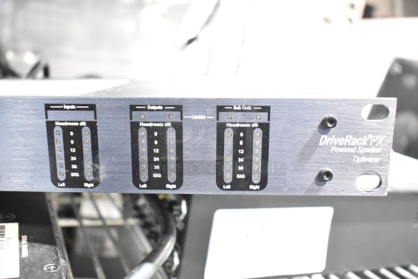 DBX DriveRack PX Powered Speaker Optimizer, showing input and output headroom dB meters, in used condition.
