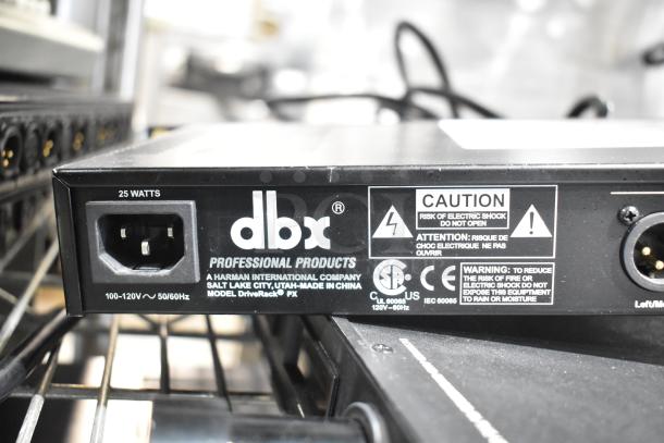 DBX DriveRack PX, 25-watt powered speaker optimizer, model details and caution label visible.