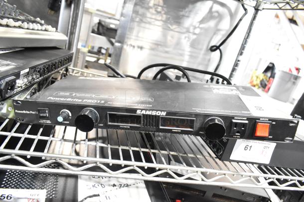Samson PowerBrite Pro15 on metal shelf, features AC distribution, dimmer, voltmeter, ammeter; auction tag visible.
