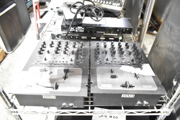 Two Rane TTM 57SL performance mixers, featuring multiple knobs and sliders, branded Rane logo. Some wear visible.