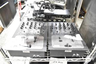 Two Rane TTM 57SL performance mixers, featuring multiple knobs and sliders, branded Rane logo. Some wear visible.