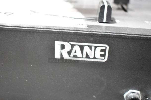 Rane TTM 57SL Performance Mixer close-up, black finish, shows Rane logo. Auction includes two units. Condition not specified.