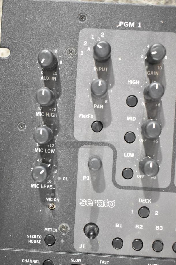 Rane TTM 57SL performance mixer with knobs for input, gain, and microphone levels. Features Serato integration.