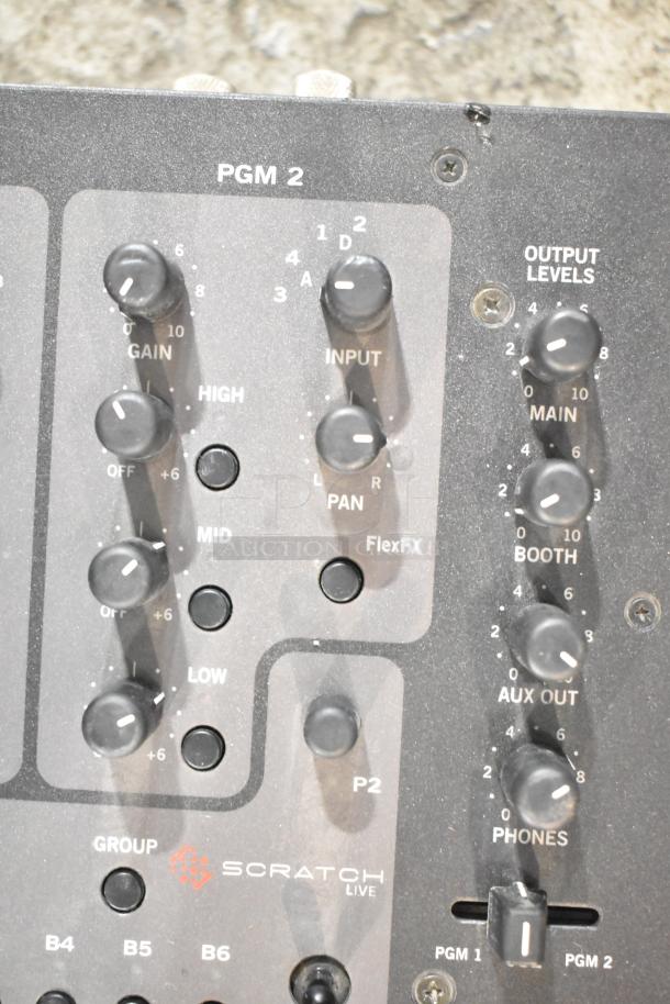 Rane TTM 57SL Performance Mixer, featuring gain, input, and output level controls. Visible Scratch Live branding. Appears well-maintained.