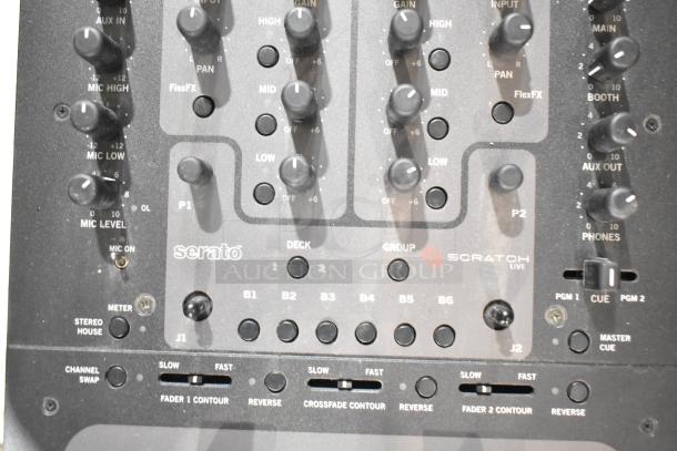 Rane TTM 57SL Performance Mixer with Serato Scratch Live, showing control knobs and inputs. Excellent condition.