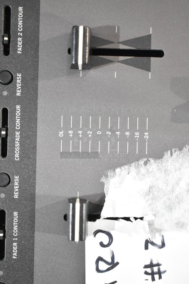 Rane TTM 57SL Performance Mixer, faders visible, used condition, crossfade contour controls, partial labeling visible.