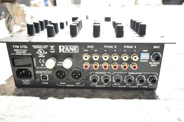 Rane TTM 57SL Performance Mixer back panel, featuring multiple audio input/output ports, USB connection, and Serato branding.
