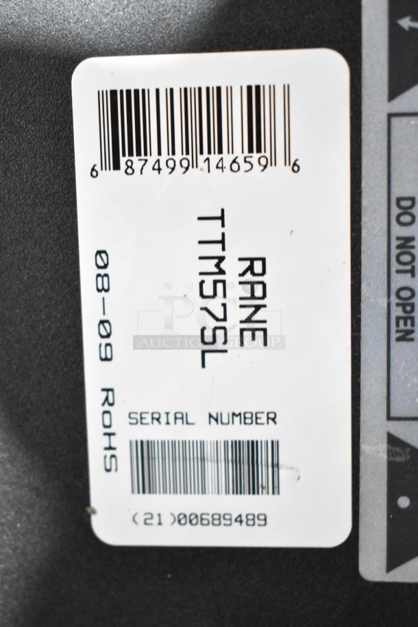 Label on Rane TTM 57SL performance mixer showing barcode, model name, and serial number; excellent condition.