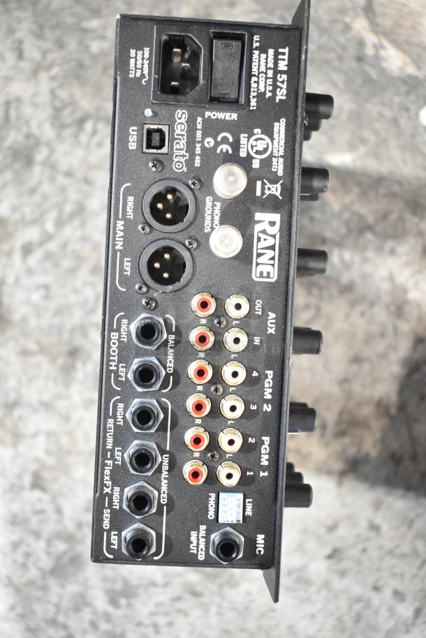 Rane TTM 57SL Performance Mixer, dual units, featuring Serato interface, multiple audio inputs/outputs, good condition.