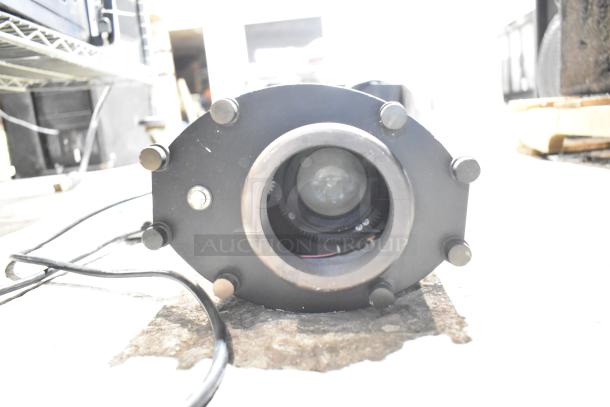 GoboSource ES-B10E stage light with visible lens and bolts, black casing, fair condition, ideal for professional use.