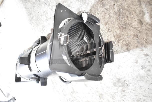 Stage light GoboSource ES-B10E, black casing, visible focus lens. Suitable for stage use, part of 9-light auction set.