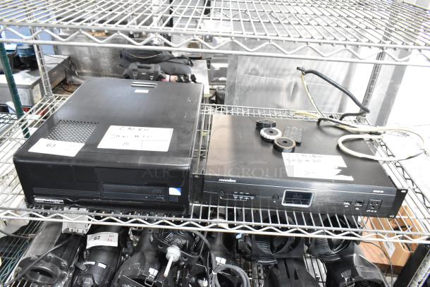 Two items on a shelf, including a Panamax M5100-PM Home Theater Power Conditioner, showing wires and a tag.