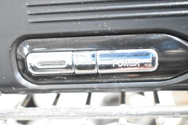 Panamax M5100-PM Home Theater Power Conditioner with chrome button labeled "POWER," in good condition.