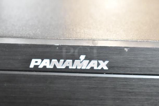 Panamax M5100-PM home theater power conditioner, black finish, brand logo visible, slight surface wear.