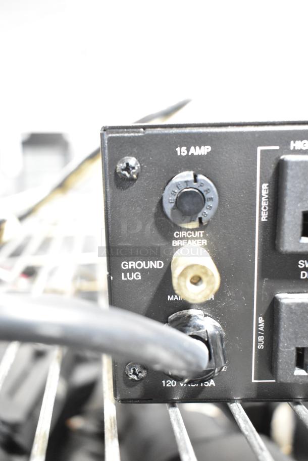 Panamax M5100-PM power conditioner, featuring a 15 AMP circuit breaker and ground lug, ideal for home theater systems.