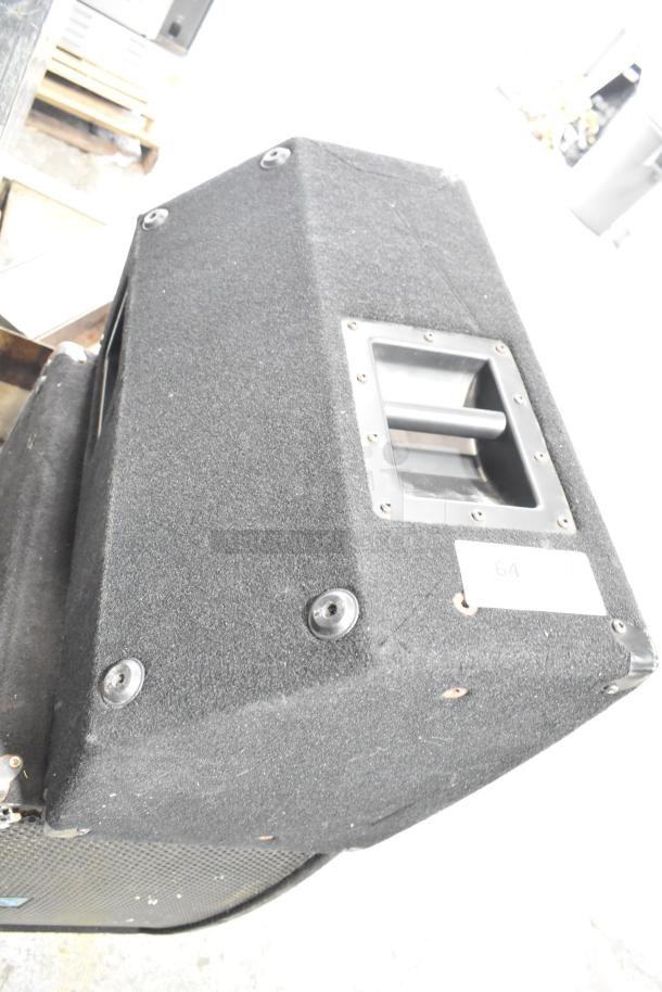 Yorkville Elite E12 speaker with textured black finish and handle. Visible label: "64". Auction offers 2 speakers total.