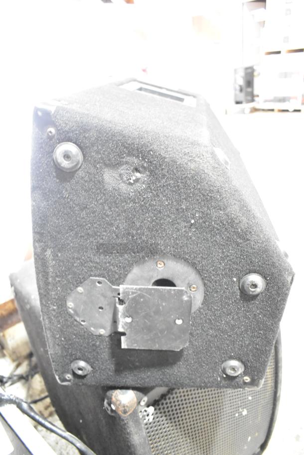 Yorkville Elite E12 speaker, worn condition, black textured exterior, visible mounting hardware; includes Yorkville LS700P.