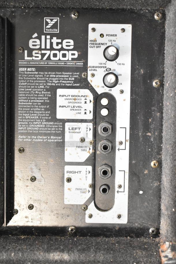 Yorkville LS700P speaker control panel with input options and frequency settings, in used condition with visible wear.