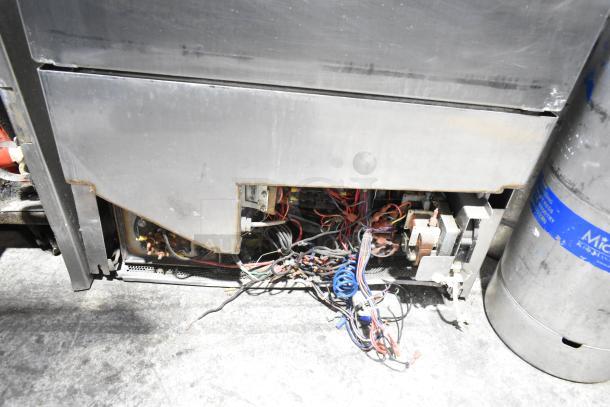 Jackson Avenger Commercial Undercounter Dishwasher, stainless steel, exposed wiring and components, needs repair.