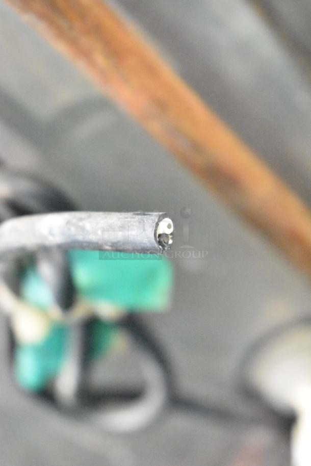 Jackson Avenger Commercial Undercounter Dishwasher, featuring solid stainless steel construction. No visible labels or markings.