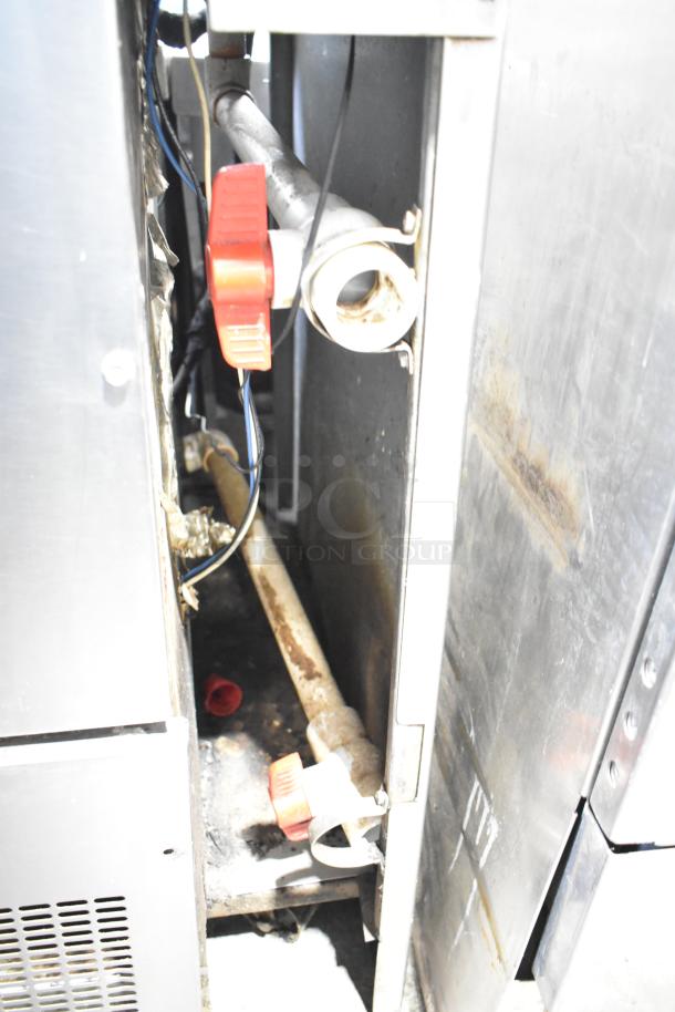Commercial pizza prep table, 115 volts, 1 phase. Image shows interior components and wiring, condition appears used.