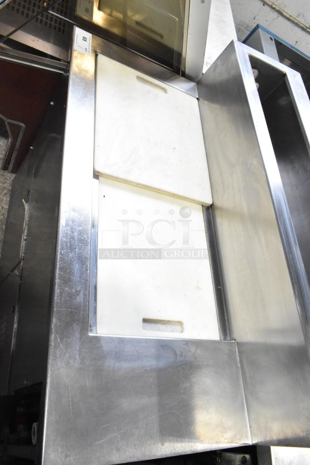 Commercial pizza prep table in stainless steel with cutting boards, 115 volts, 1 phase.