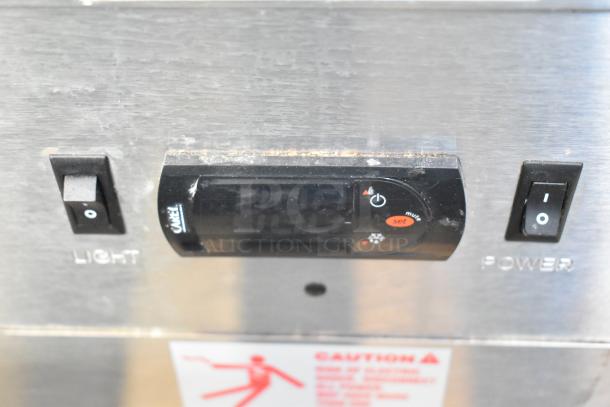 Federal Industries SQ3CB deli display case controls showing power and light switches, digital display panel.