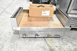Star Commercial Electric Griddle with flat top, dual side grease trays, and visible wear. Model number tag on front.
