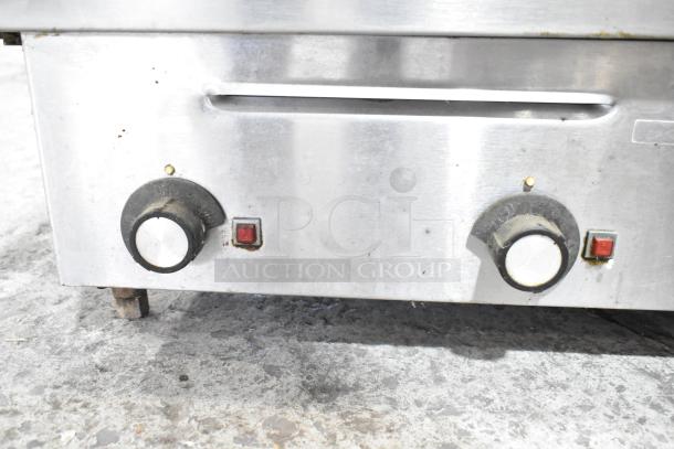 Star Commercial Electric Flat Top Griddle, used, dual side grease trays, adjustable knobs, stainless steel exterior.