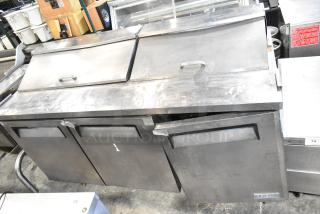 Turbo Air MST-72 commercial sandwich salad prep table in used condition; features mega top, bain marie, and commercial casters.