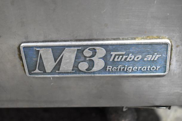 Turbo Air MST-72 commercial sandwich salad prep table with M3 Turbo Air Refrigerator badge, showing wear, on casters.