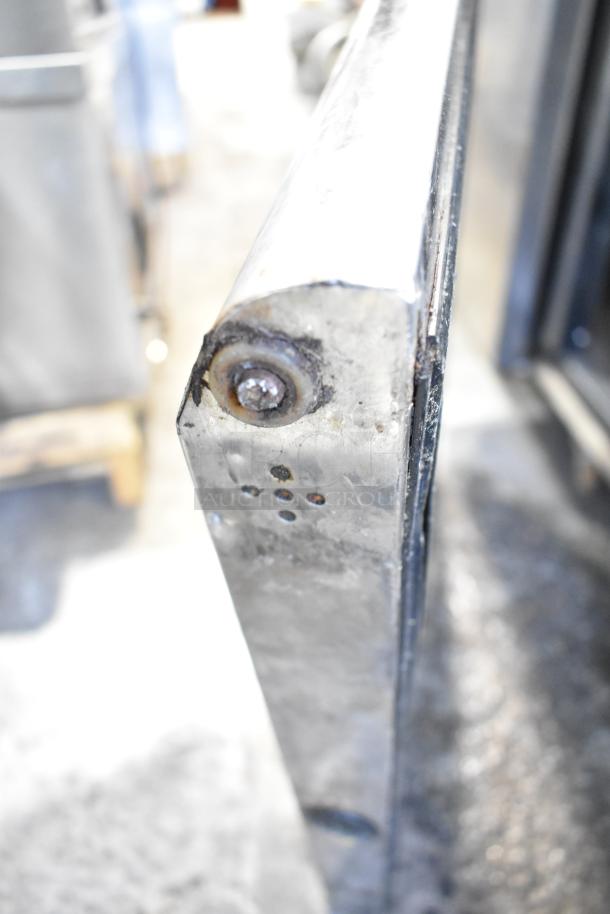 Turbo Air MST-72 prep table detail, showing condition of corner edge with visible wear and bolt structure.