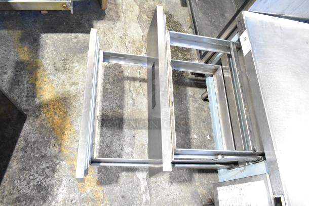 Delfield commercial chef base with two stainless steel drawers, commercial casters, 115 volts, 1 phase.