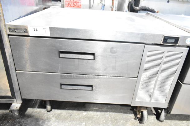 Delfield commercial 2-drawer chef base, stainless steel, on casters, 115 volts, 1 phase, visible branding and auction tag.
