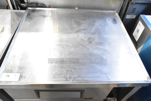 2019 True TRCB-36 16GA 2 Drawer Chef Base with commercial casters, stainless steel top, visible signage "75 QTY".