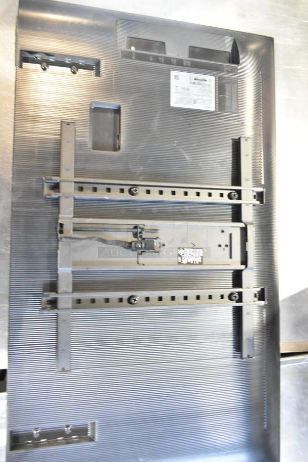 Samsung BE43D-H 43" TV back view, showing mounting bracket and product label. Requires pickup, no shipping.