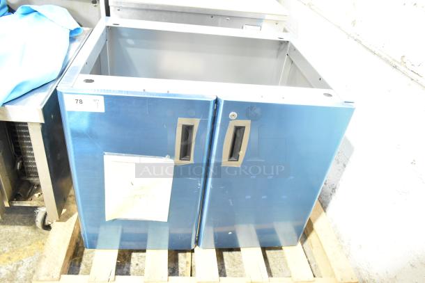 BRAND NEW Hoshizaki SD-750 Ice Machine Stand, scratch and dent, dual doors, metal build, blue finish, installation instructions visible.