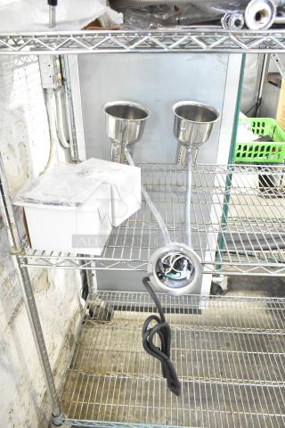 Avantco Commercial 2 Head Lamp, 115 volts, 1 phase, stainless steel, excellent condition, on metal shelf.